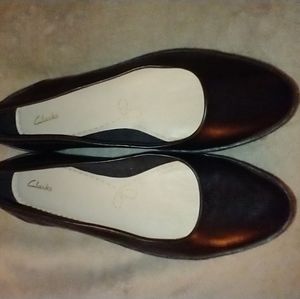 Clarks black flats with thick crepe sole